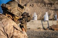 A Marine fires from an M4A1 carbine at Marine Corps Base Camp Pendleton.