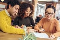 Couple signing a lease document