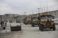 British troops with NATO-led Resolute Support Mission forces travel, in Kabul, Afghanistan