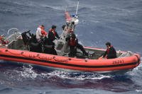 Coast Guard Cutter Thetis’ crewmembers deploy the cutter’s small boat