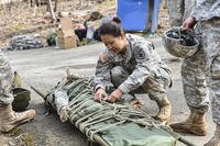 Medical students at the Uniformed Services University perform drills.