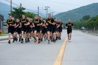 Soldiers take part in group run in Korea.