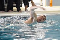 Student swims using the freestyle stroke.