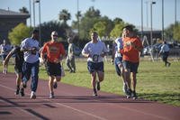 We Have York Pace members help an Air Force airman during a physical fitness test.