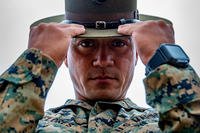 A Marine drill instructor adjusts his campaign cover.