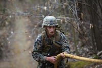 Marine negotiates the endurance course.