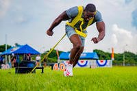 Marine pulls a weighted sled in a competition in Okinawa.