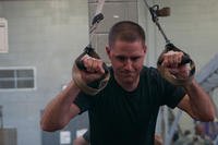 A Copperas Cove Special Weapons and Tactics team member trains on TRX.