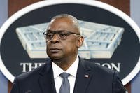 Secretary of Defense Lloyd Austin pauses while speaking