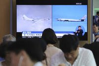 Russian Tu-95 bomber and Chinese H-6 bomber