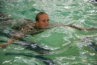 A Marine recruit swims laps during qualifications.