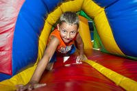 Family and service members enjoy an activity at Travis Air Force Base.