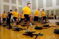 Sailors participate in command fitness leader training.
