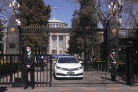 Chinese paramilitary policeman stands guard at the entrance to the Russian Embassy in Beijing