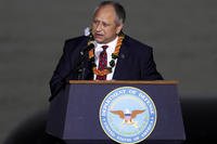 Navy Secretary Carlos Del Toro speaks at the 80th Pearl Harbor Anniversary ceremony