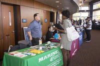 Jim Maher, director behavioral health department, Marine Corps Logistics Base Barstow, California, discusses services offered for base personnel by his office and what skill sets they need in future employees at a San Bernardino County Job and Opportunities Fair at Barstow Community College.