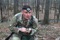 Pennsylvania Army National Guard soldier using a lensatic compass.