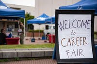 Community members onboard Commander, Fleet Activities Yokosuka (CFAY) in Japan participate in a Family Employment Readiness Fair hosted by the Fleet and Family Support Center.