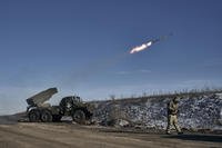 Ukrainian army Grad multiple rocket launcher fires.