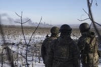 Ukrainian soldiers watch during fighting between Ukrainian and Russian forces in Soledar, Donetsk region, Ukraine