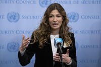 Emine Dzhaparova, First Deputy Foreign Minister of Ukraine, speaks to a group.