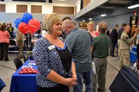 A district operations manager with U.S. Bank discusses job opportunities with veterans at the Lane County Armed Forces Reserve Center in Springfield, Ore., during a Hero2Hired (H2H) job fair.