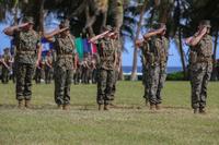 U.S. Marines render a salute during the Marine Corps Base (MCB) Camp Blaz Reactivation and Naming Ceremony at Asan Beach, Guam, Jan. 26, 2023. (U.S. Marine Corps photo by Lance Cpl. Garrett Gillespipe) Marine Corps Base Camp Blaz Reactivation and Naming Ceremony in Guam.