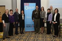 Coordinators of the second annual Spouse Symposium at Dover Air Force Base, Del., stand for a group photo.