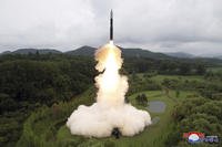 test-firing of an Hwasong-18 ICBM, at an undisclosed location, in North Korea