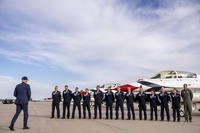 President Joe Biden greets a group of Thunderbird pilots