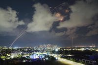 Israeli Iron Dome air defense system fires to intercept a rocket fired from the Gaza Strip