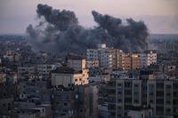 Smoke rises following an Israeli airstrike in Gaza City