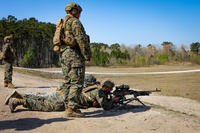 U.S. Marines with the School of Infantry-East engage an enemy target point with a M240B machine gun during the Combat Instructor Stakes competition at Camp Geiger, N.C.