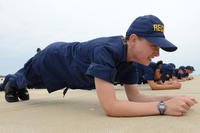 A Coast Guard recruit from Company Oscar 188 does plank exercises during incentive training at Coast Guard Training Center Cape May, N.J.