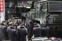 North Korean leader Kim Jong Un, inspects as he tours munitions factories