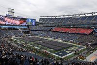 Army Cadets fill the field in formation before an NCAA football game between the Navy Midshipmen and the Army Black Knights