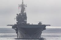 USS Boxer (LHD 4) conducts flight quarters while transiting the Pacific Ocean