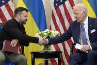 U.S. President Joe Biden shakes hands with Ukrainian President Volodymyr Zelenskyy