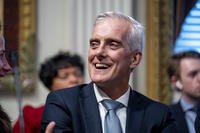 Veterans Affairs Secretary Denis McDonough laughs as he waits for a speech by President Joe Biden about supply chain issues in the Indian Treaty Room on the White House complex in Washington.