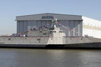 The Littoral Combat Ship Coronado sits alongside the Austal USA facilities on the Mobile River