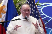 Philippine Defense Secretary Gilberto Teodoro Jr. gestures during his speech