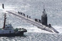 The USS Vermont, a nuclear-powered and fast-attack submarine, enters a naval base in Busan, South Korea