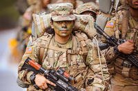 A soldier in training with Delta Company, 2nd Battalion, 58th Infantry Regiment, 198th Infantry Brigade conducts a 12-mile ruck march on Fort Moore, Georgia.