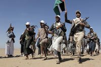 Houthi rebel fighters march during a rally of support for the Palestinians in the Gaza Strip