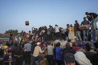 Palestinians are storming trucks loaded with humanitarian aid