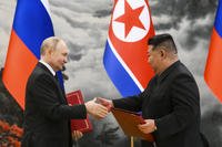 Russian President Vladimir Putin, left, and North Korea's leader Kim Jong Un