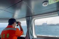 Taiwan Coast Guard monitors a China Coast Guard boat as it passes near the coast of Matsu islands