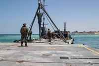 U.S. Army soldiers at the Trident Pier on the Gaza coast