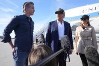 President Donald Trump speaks as first lady Melania Trump and California Gov. Gavin Newsom listen