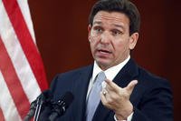 Florida Gov. Ron DeSantis answers questions from the media